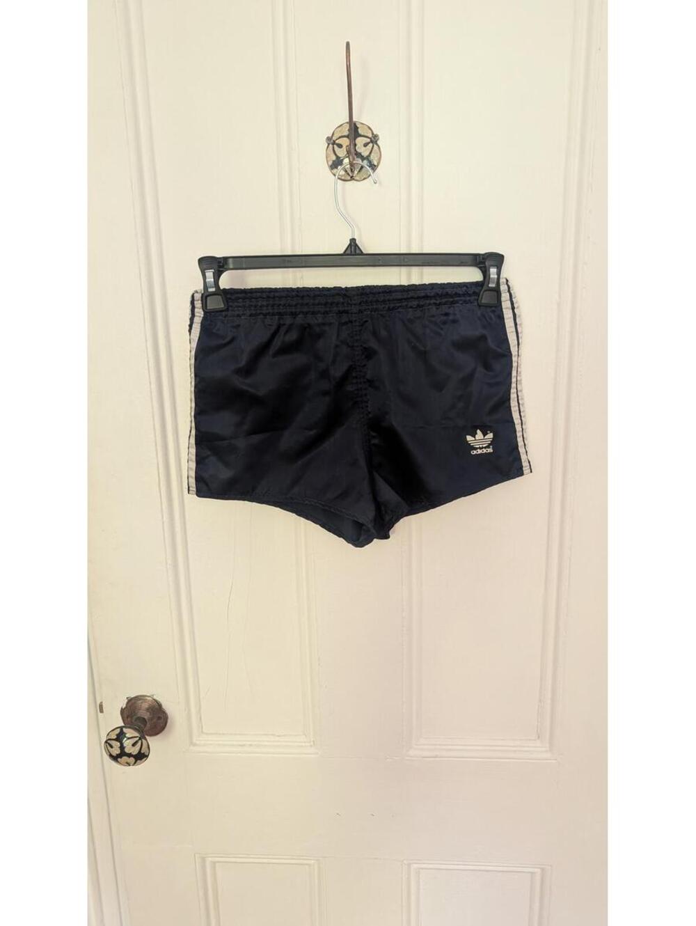 Adidas Women's Navy Blue Athletic Shorts with White Stripes